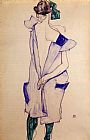 Standing Girl in a Blue Dress and Green Stockings Back View by Egon Schiele